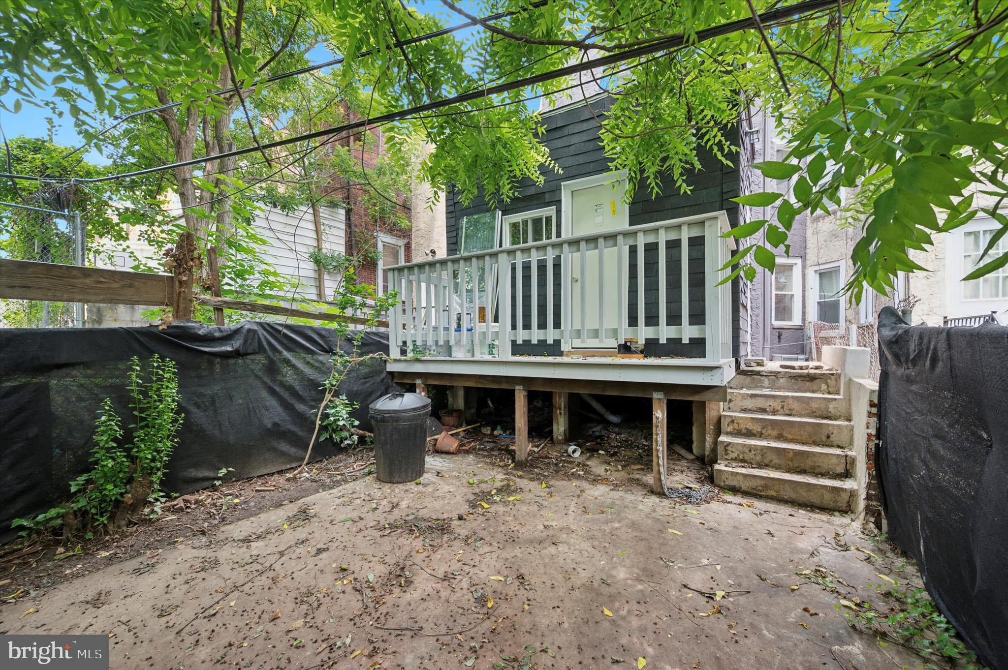 6212 Callowhill Street Philadelphia, PA 19151 - Photo 10 of 23 a front view of a house with a garden