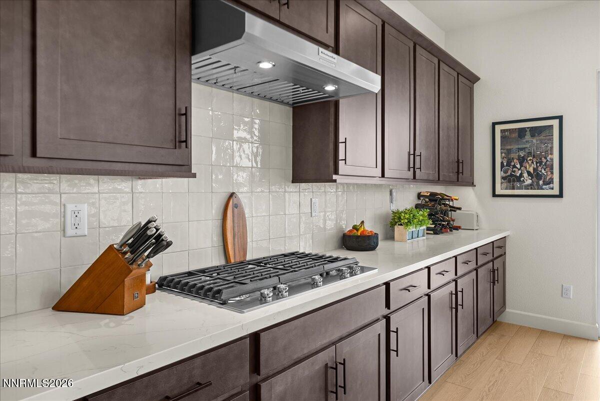 348 South Pah Rah Rdg Drive Sparks, NV 89441 - Photo 20 of 45 a kitchen with stainless steel appliances granite countertop a stove and a sink