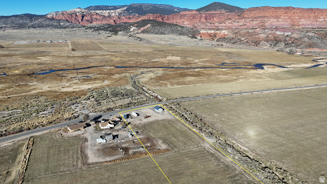 890 East Hatchery Road Bicknell, UT 84715 - Photo 2 of 48 View of rural area featuring a mountainous background