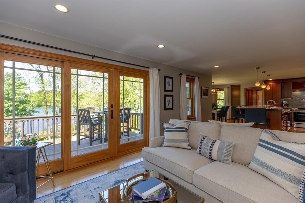 8 Merrimack River Road Groveland, MA 01834 - Photo 14 of 39 a living room with furniture and a large window