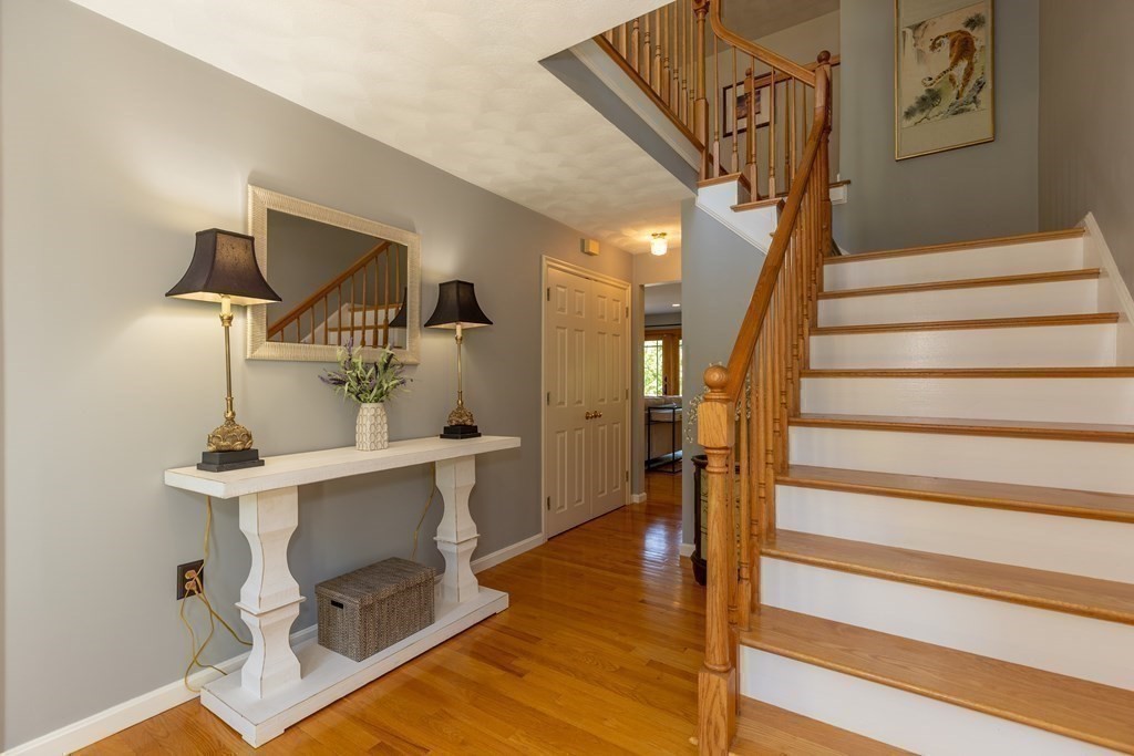 8 Merrimack River Road Groveland, MA 01834 - Photo 19 of 39 a view of entryway and hall with wooden floor