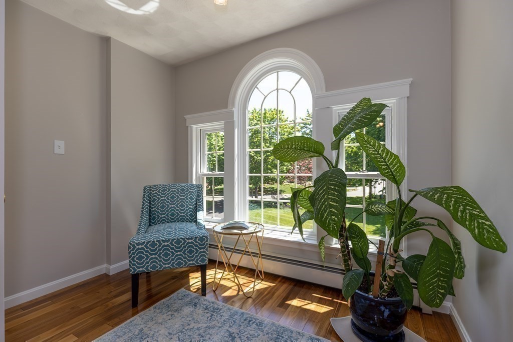8 Merrimack River Road Groveland, MA 01834 - Photo 21 of 39 a living room filled with furniture and a potted plant