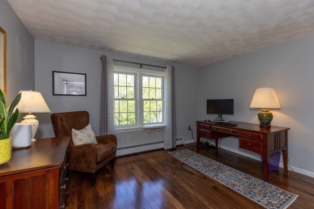 8 Merrimack River Road Groveland, MA 01834 - Photo 25 of 39 a living room with furniture and a window