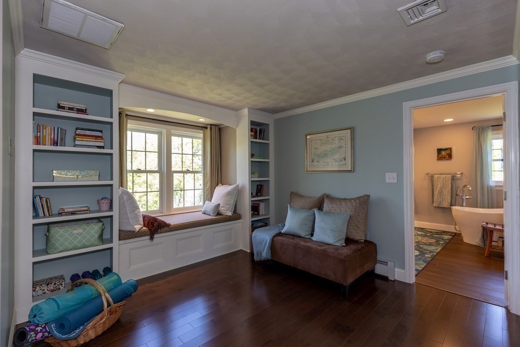 8 Merrimack River Road Groveland, MA 01834 - Photo 29 of 39 a living room with furniture and a wooden floor