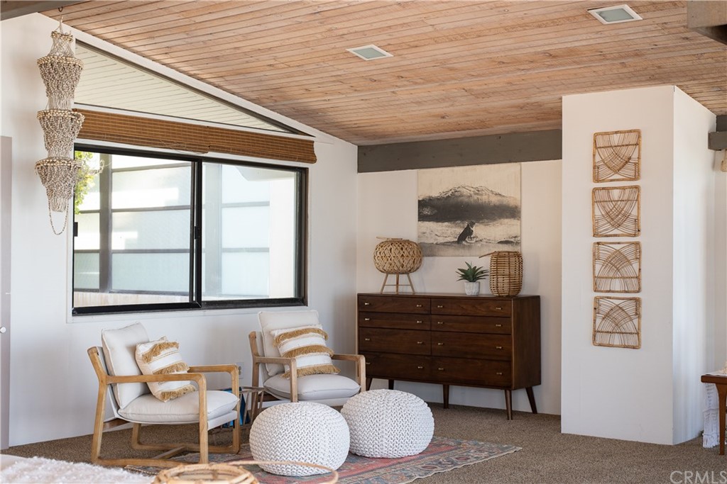 35261 Beach Road Dana Point, CA 92624 - Photo 15 of 34 a living room with furniture and a painting on the wall