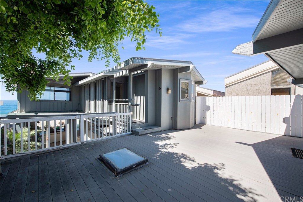 35261 Beach Road Dana Point, CA 92624 - Photo 22 of 34 a front view of a house with deck