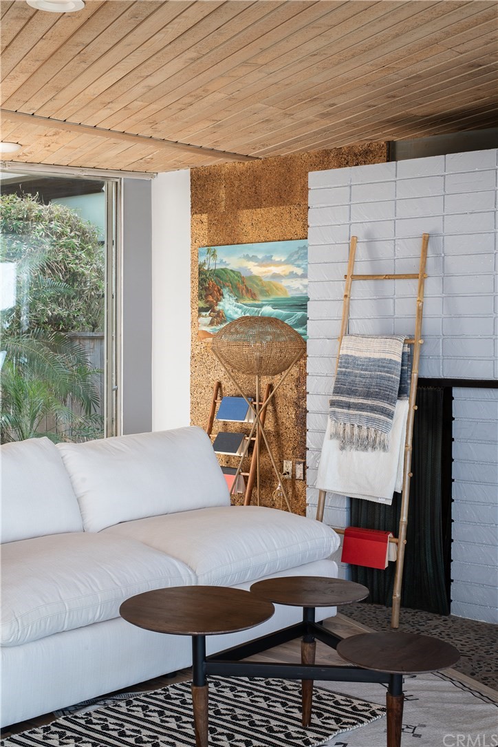 35261 Beach Road Dana Point, CA 92624 - Photo 7 of 34 a living room with a couch and a table