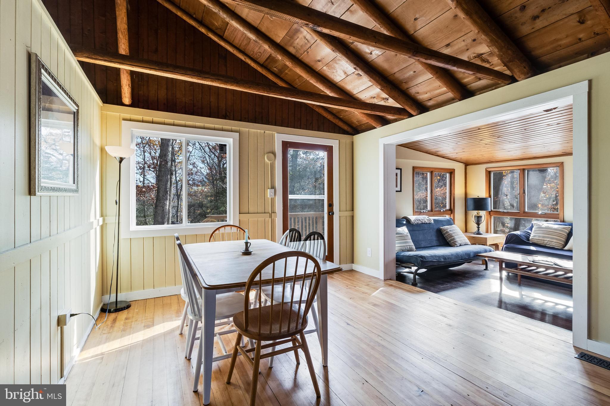 970 Eagle Point Lusby, MD 20657 - Photo 14 of 26 a dining room with furniture and wooden floor