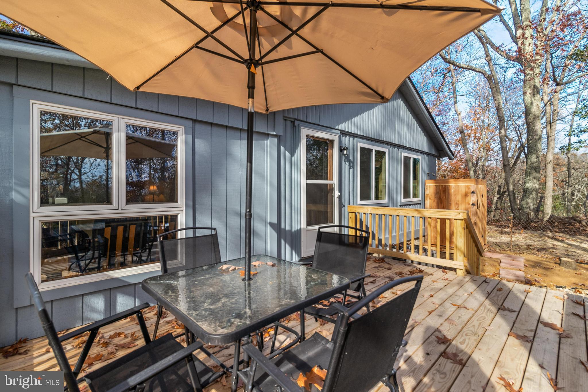970 Eagle Point Lusby, MD 20657 - Photo 10 of 26 a view of a house with backyard and sitting area