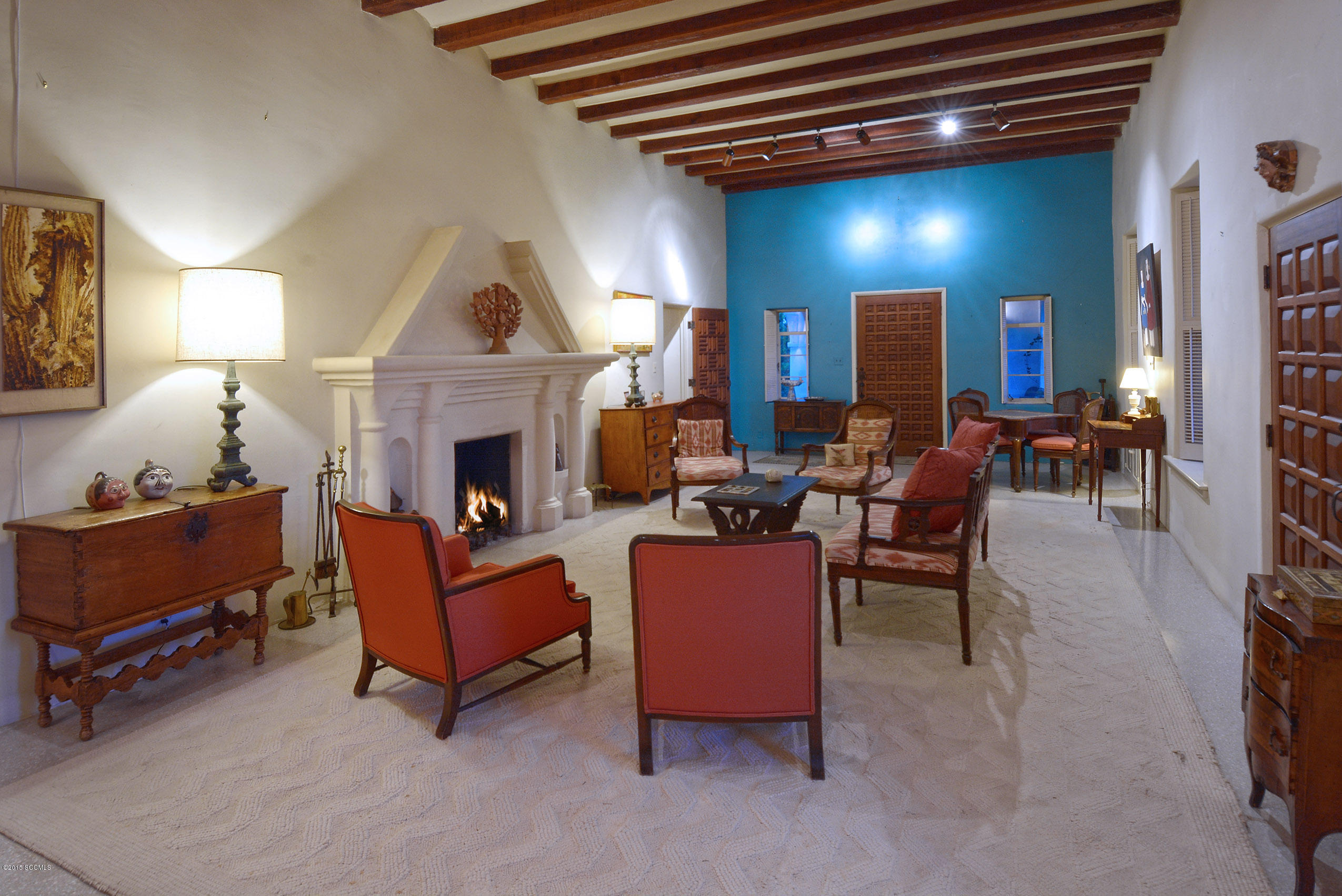 87 Clark Crossing Road Rio Rico, AZ 85648 - Photo 12 of 51 a living room with furniture and a fireplace