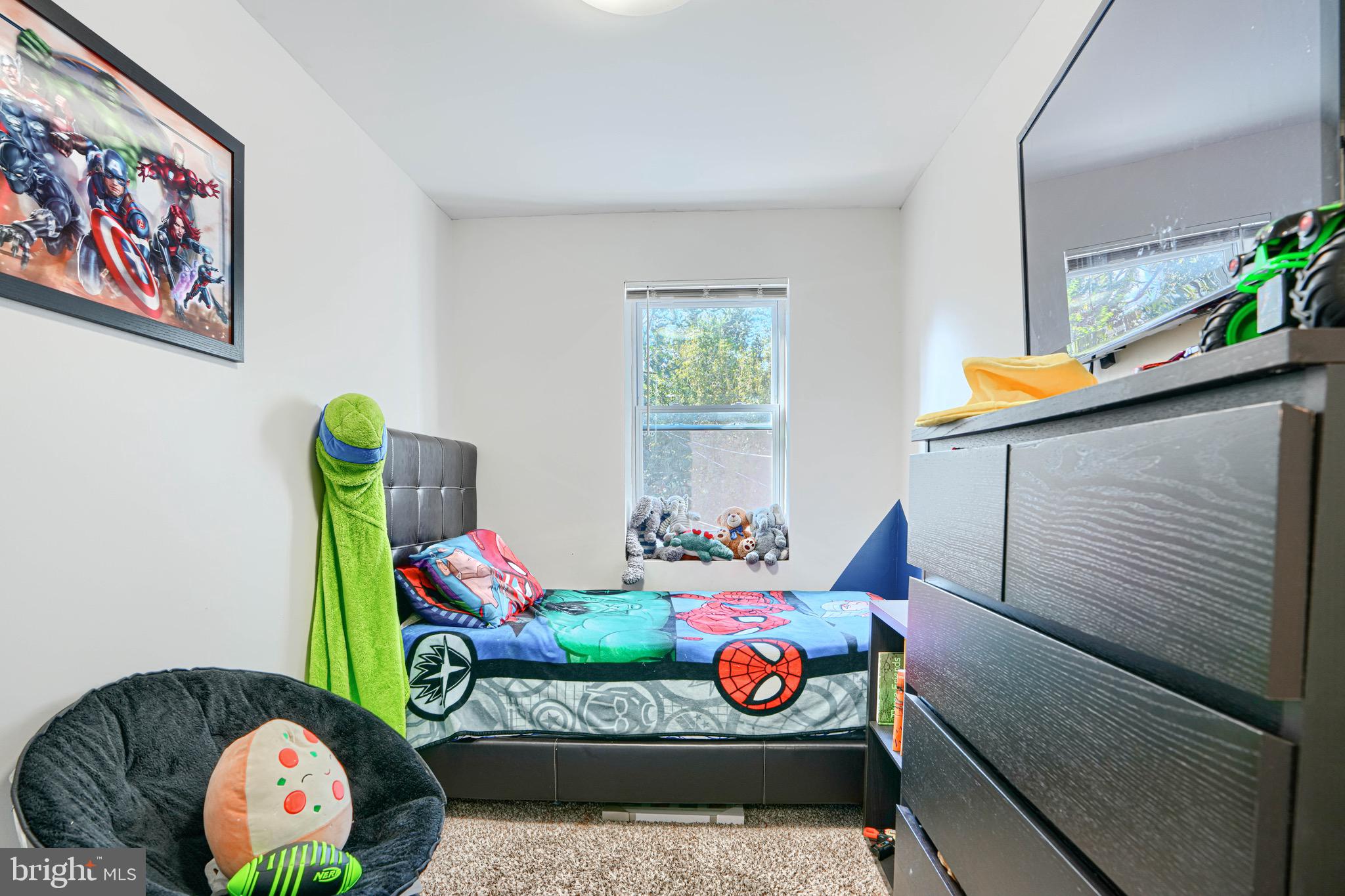 4054 Hilton Road Baltimore, MD 21215 - Photo 15 of 26 a view of a dining room with furniture and toys