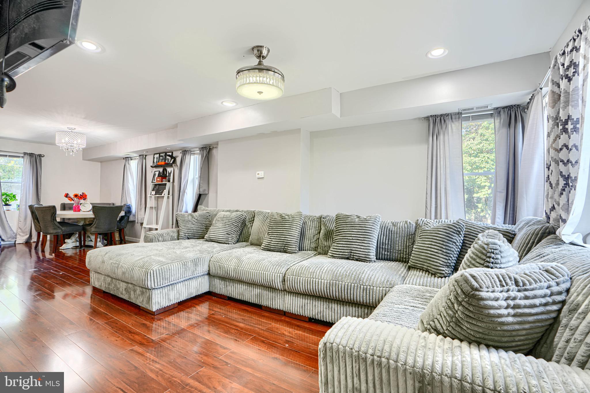 4054 Hilton Road Baltimore, MD 21215 - Photo 2 of 26 a living room with furniture and a large window