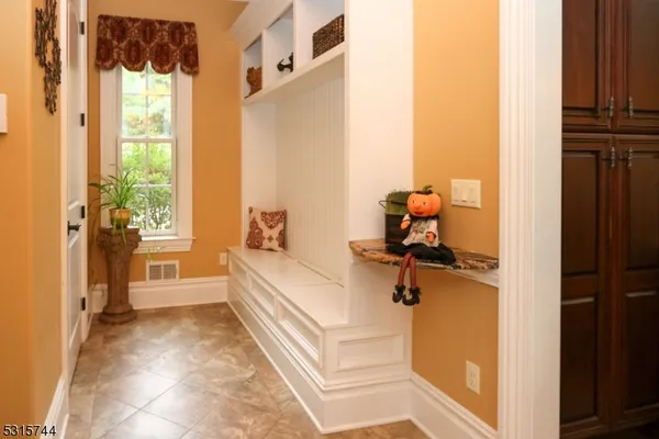 a room with a window and a table