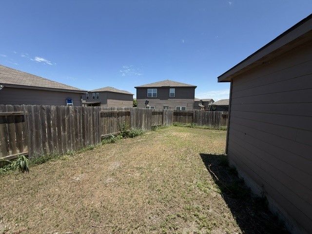 124 Niven Path Jarrell, TX 76537 - Photo 14 of 15 a house view with a outdoor space