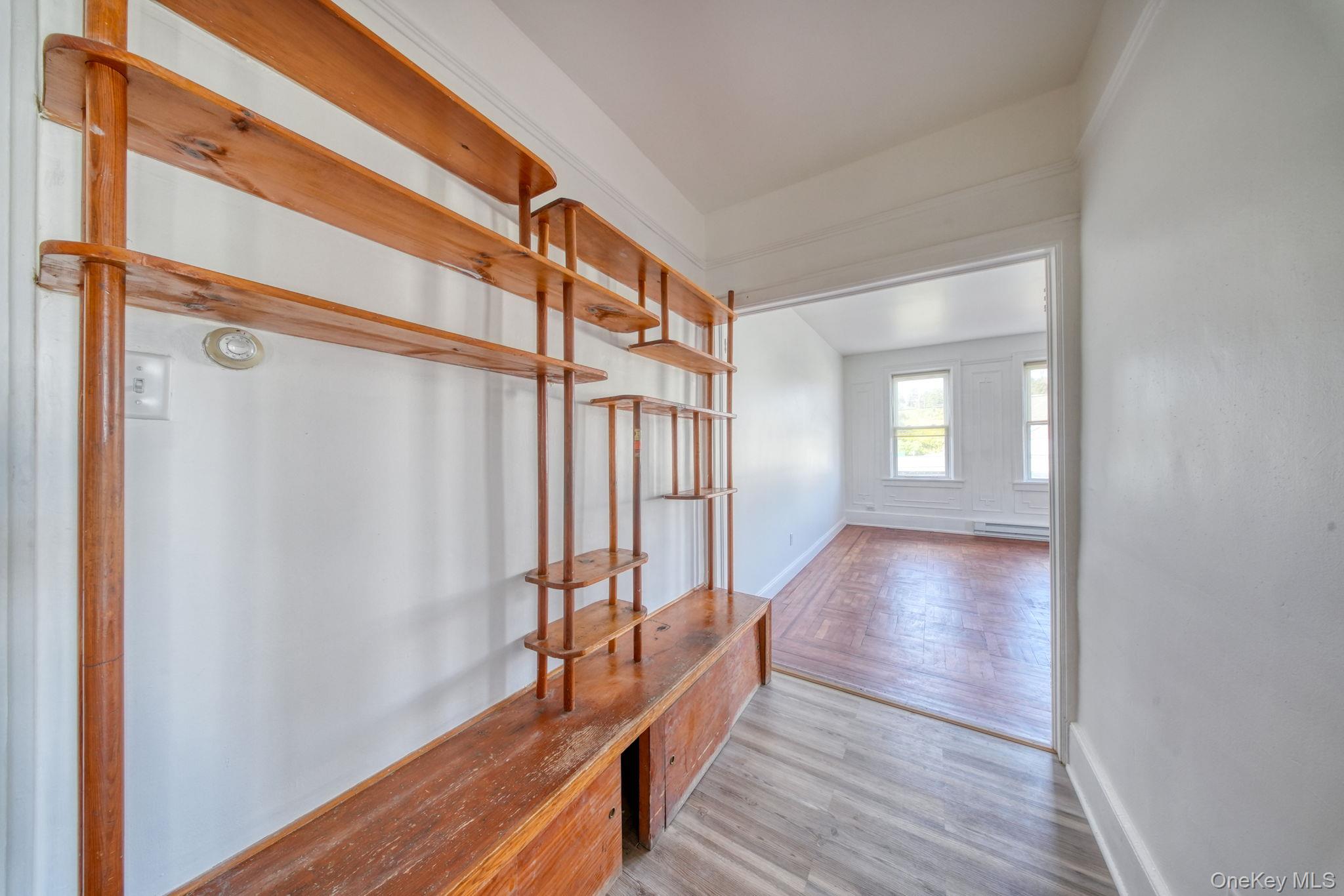 9 Mongaup Road Hurleyville, NY 12747 - Photo 33 of 35 Corridor with wood finished floors and a baseboard radiator