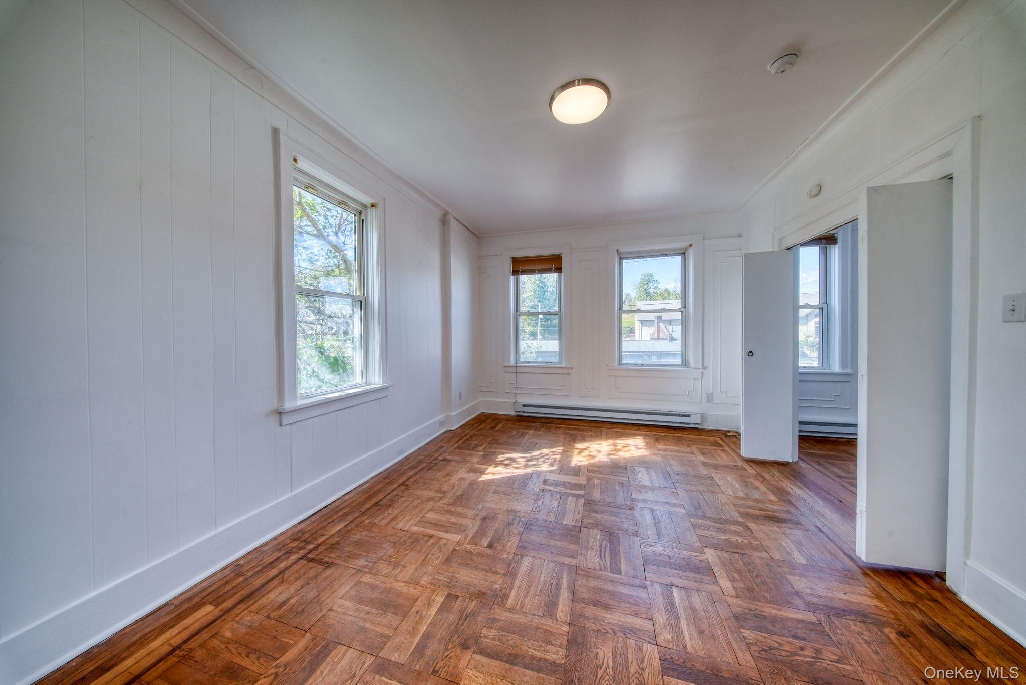 9 Mongaup Road Hurleyville, NY 12747 - Photo 9 of 35 Empty room with crown molding and baseboard heating
