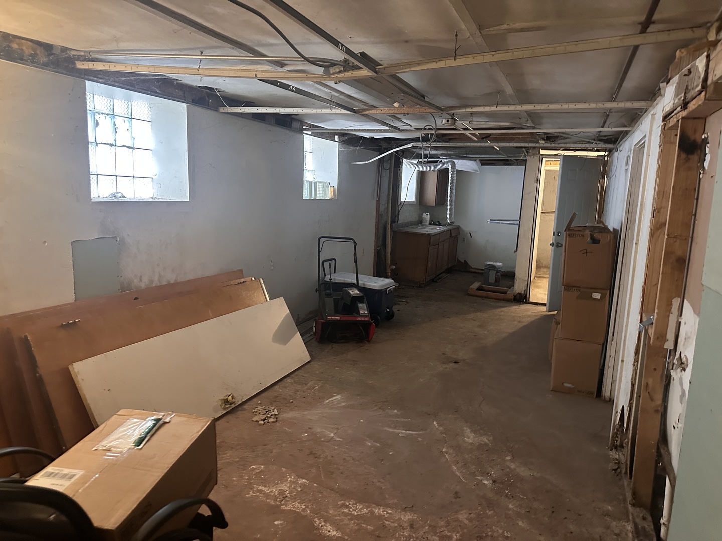 26 East 101st Place Chicago, IL 60628 - Photo 18 of 22 a bed room with a bed and a window