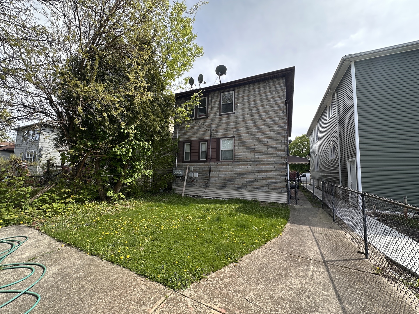 26 East 101st Place Chicago, IL 60628 - Photo 21 of 22 a view of a back yard of the house