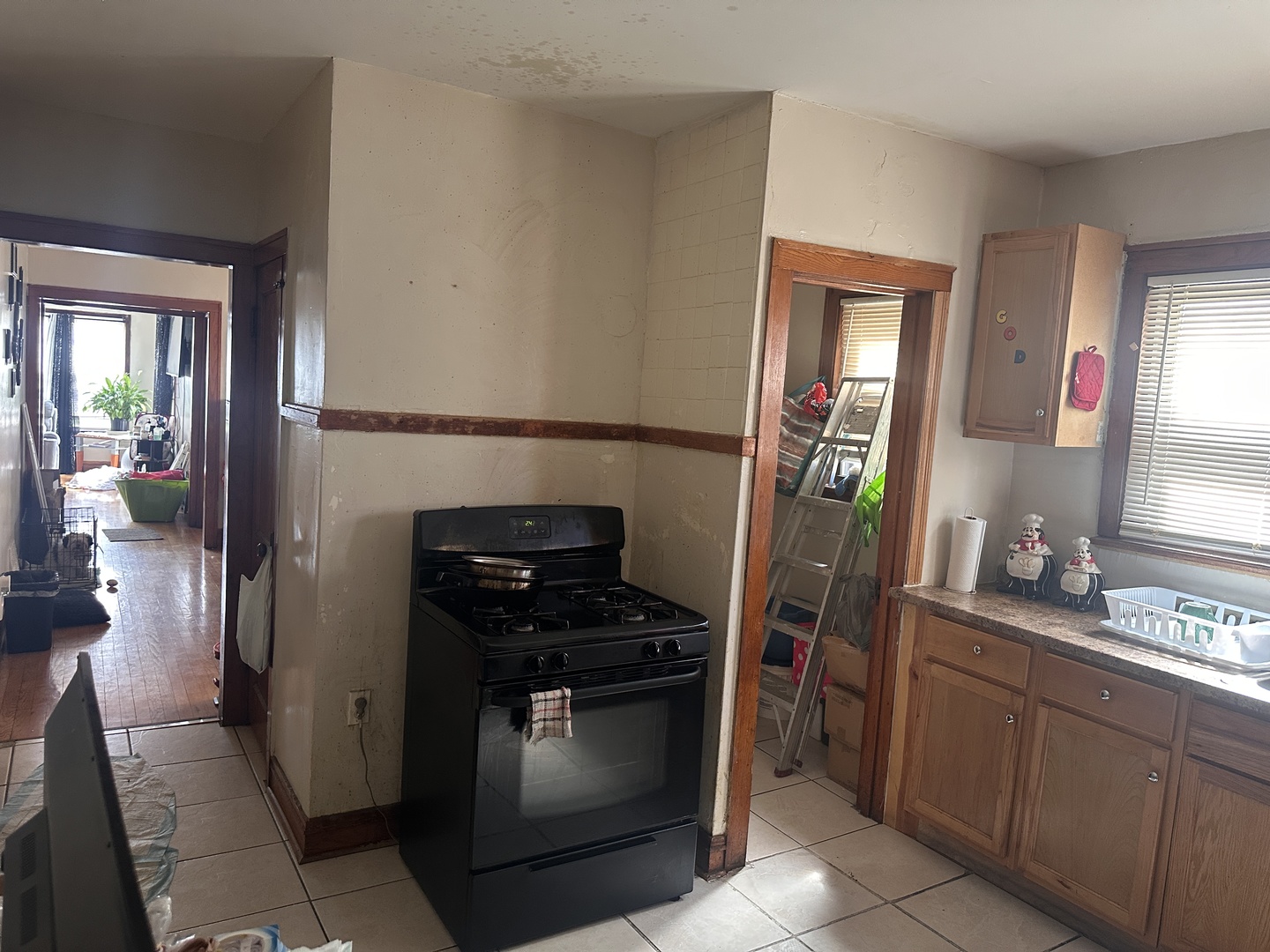 26 East 101st Place Chicago, IL 60628 - Photo 8 of 22 a kitchen with a refrigerator and a stove