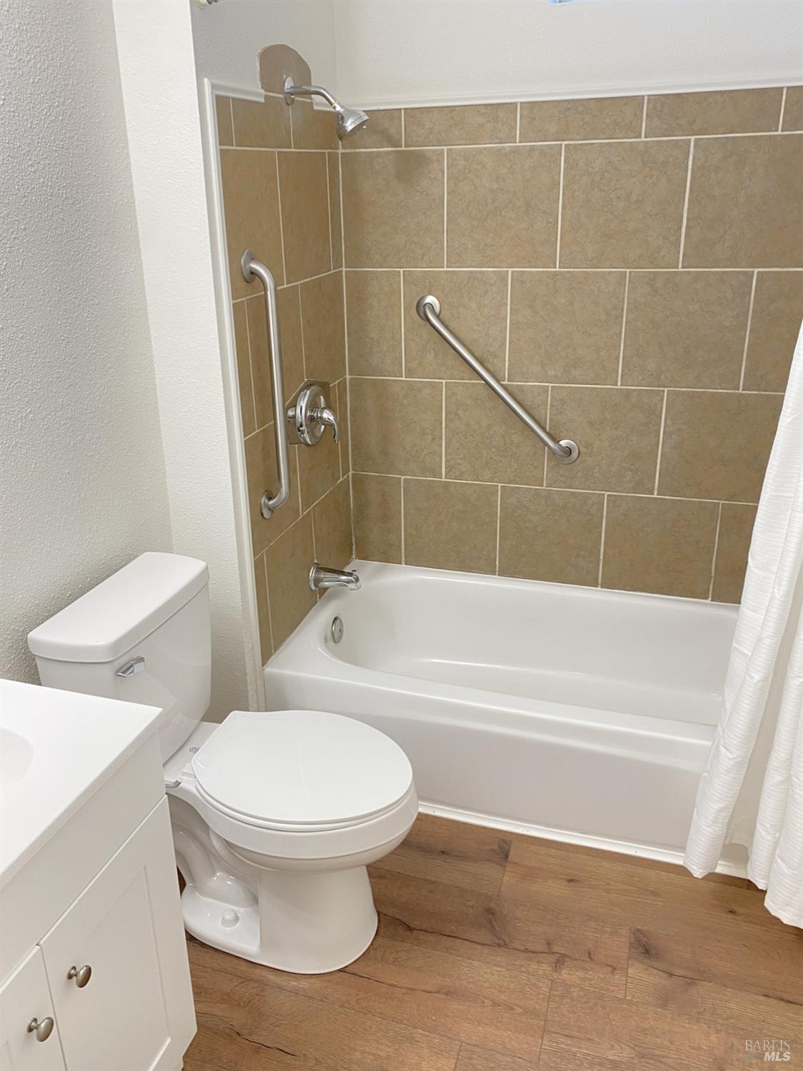 1047 Ohio Street Fairfield, CA 94533 - Photo 22 of 36 a bathroom with toilet shower and a bathtub