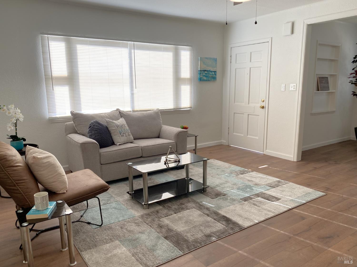 1047 Ohio Street Fairfield, CA 94533 - Photo 7 of 36 a living room with furniture and a window