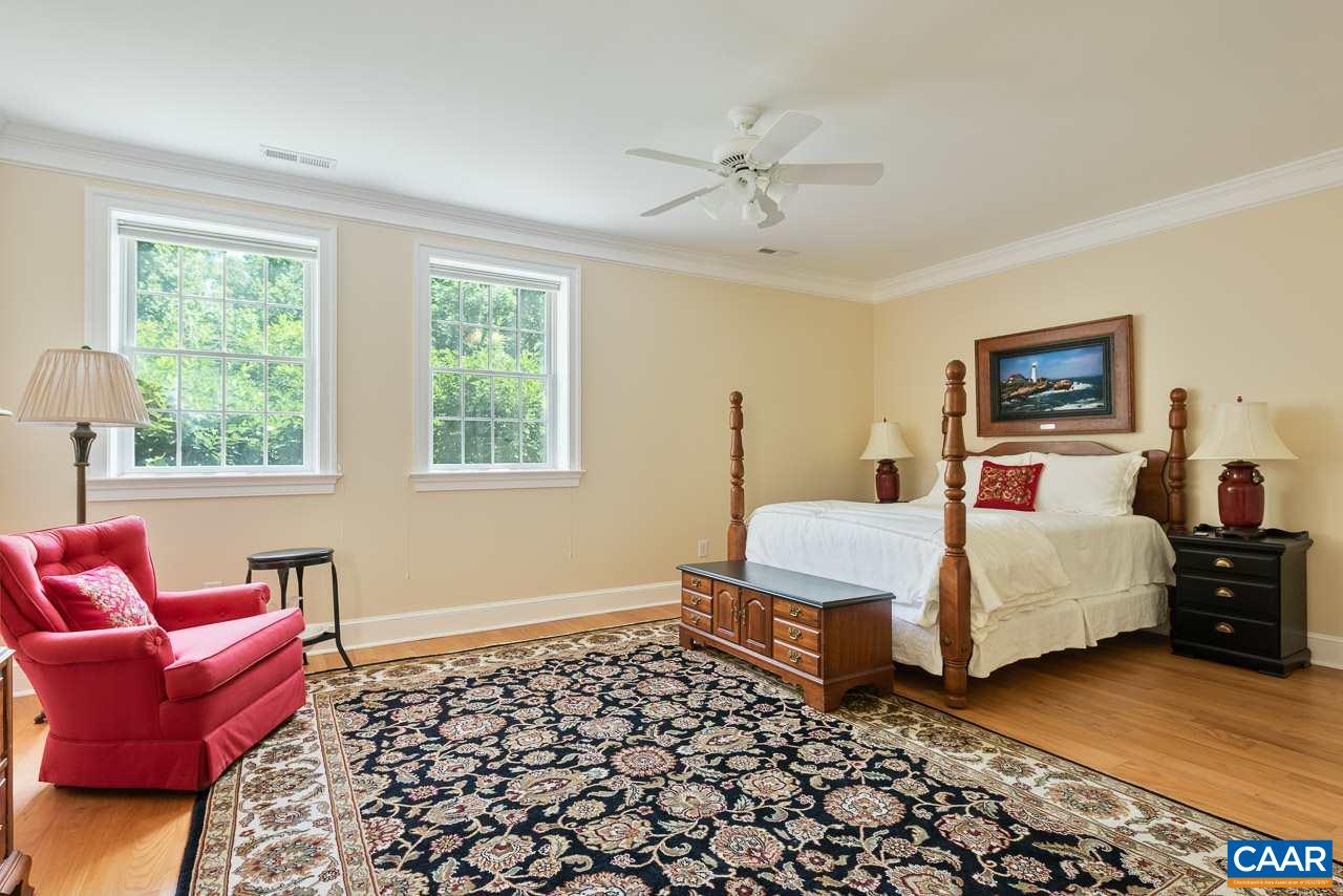 2274 Garth Road Charlottesville, VA 22901 - Photo 23 of 32 a bedroom with a bed and window