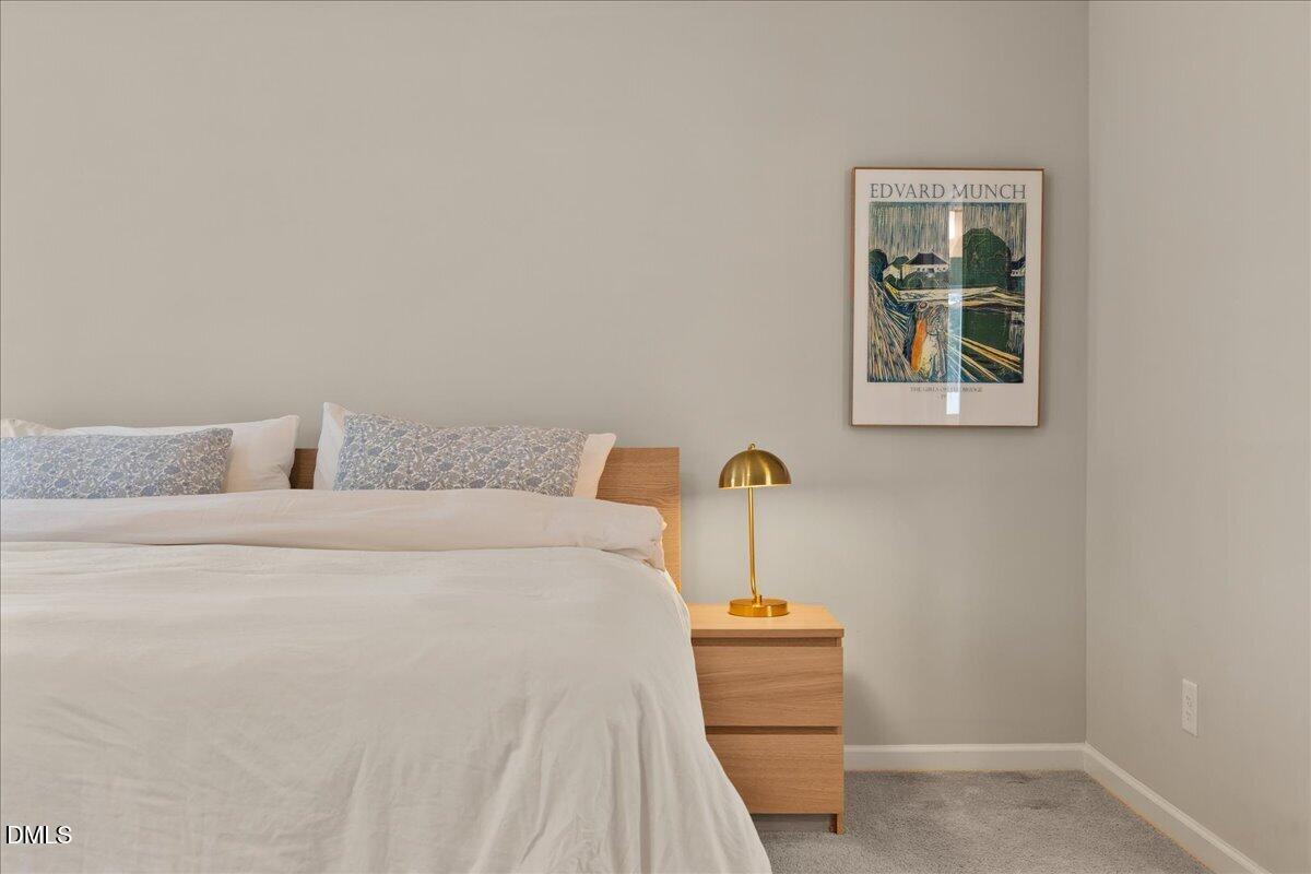 1237 Huffington Oak Drive Willow Spring, NC 27592 - Photo 19 of 34 a bedroom with a bed and a window