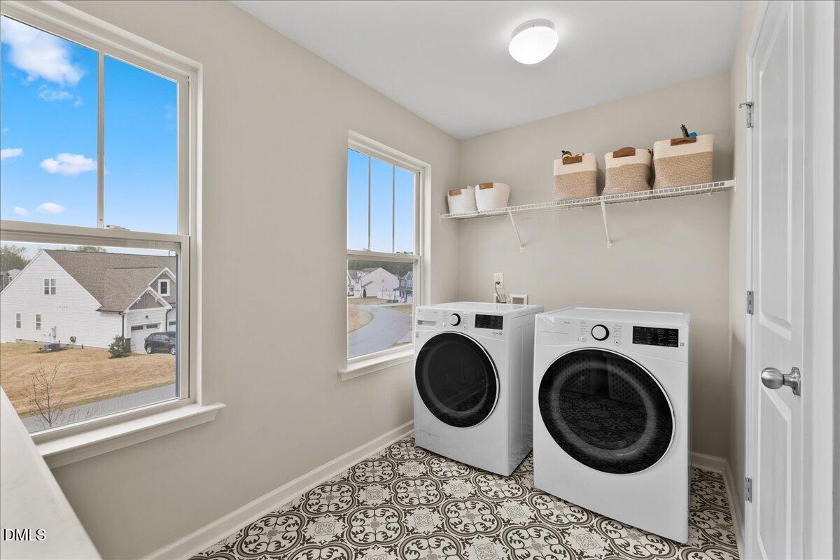 1237 Huffington Oak Drive Willow Spring, NC 27592 - Photo 28 of 34 a utility room with dryer and washer