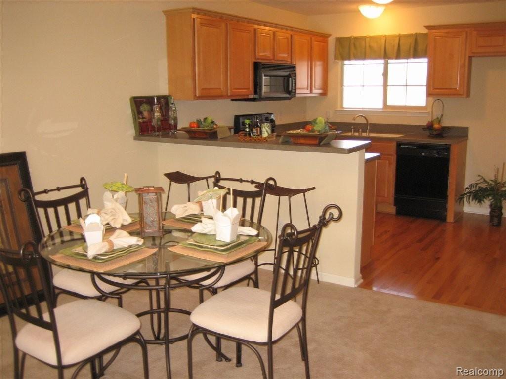 4693 Summer Ridge Drive, Unit 23 Howell, MI 48843 - Photo 11 of 12 Open Nook