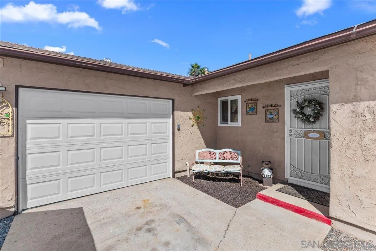 9254 Shadow Hill Road Santee, CA 92071 - Photo 2 of 34 a car parked in front of house
