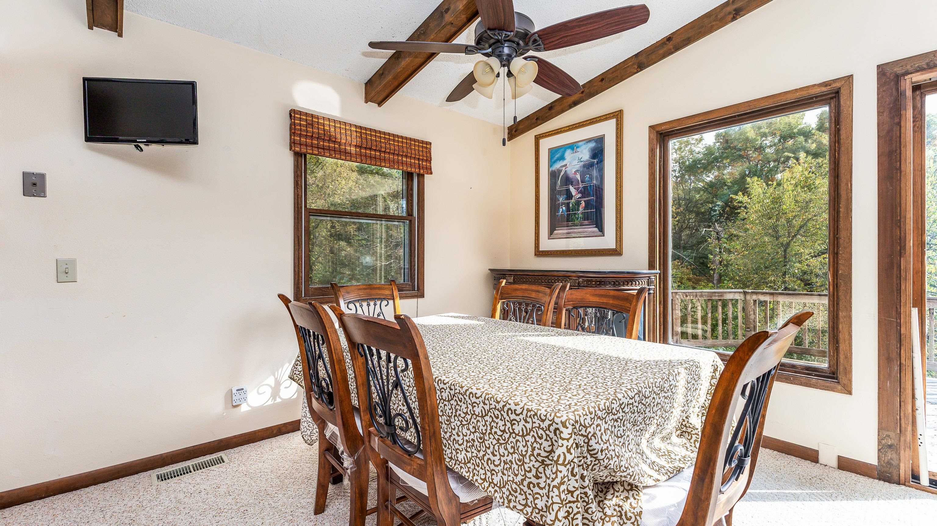 6 Meadow Path Galena, IL 61036 - Photo 9 of 29 a view of a dining room with furniture window and outside view