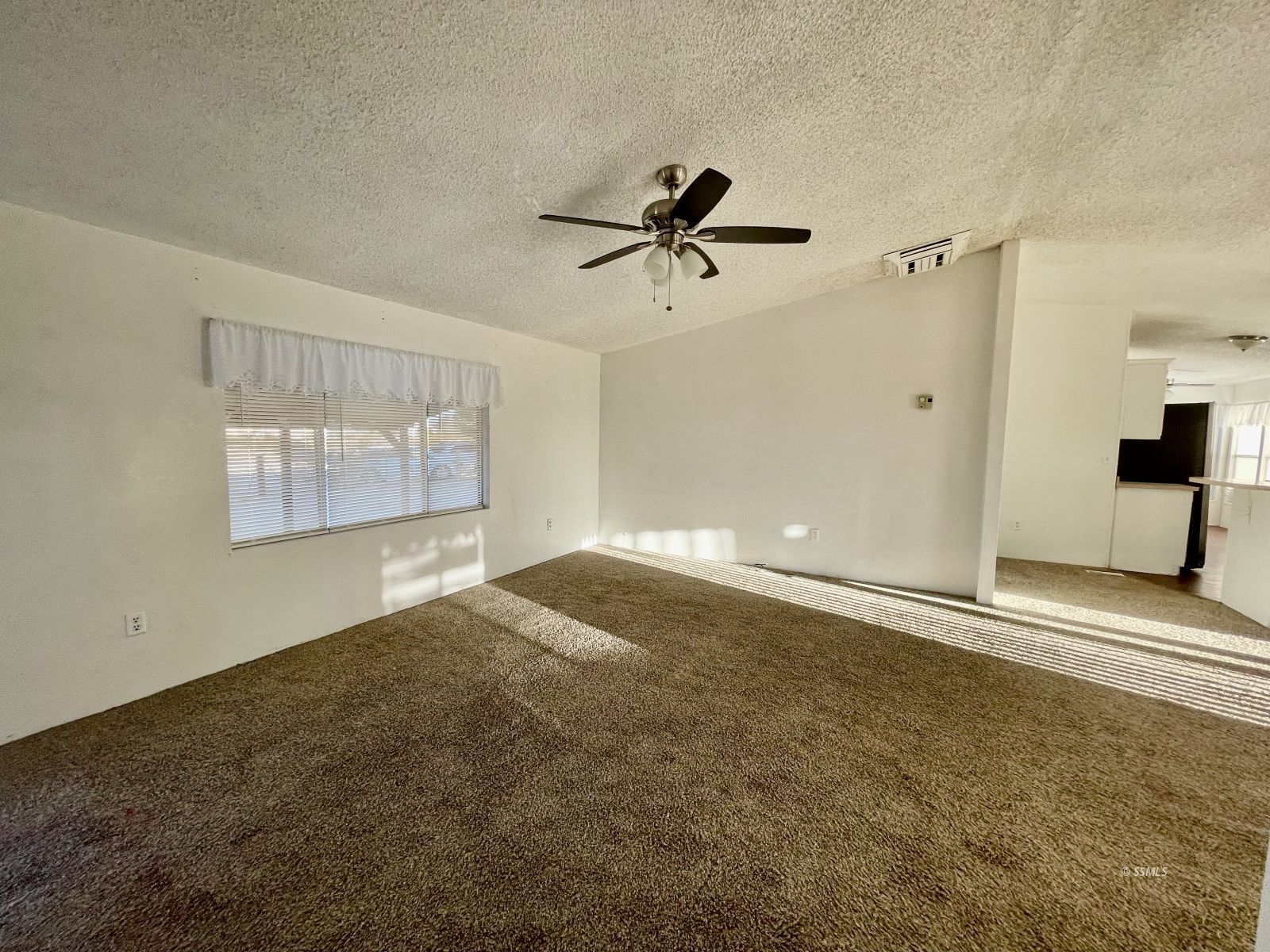 1465 Pony Street Ridgecrest, CA 93555 - Photo 20 of 32 a view of empty room with wooden floor