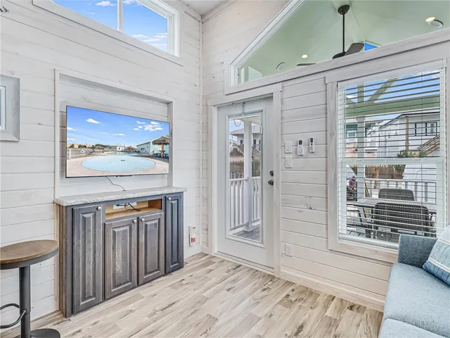 a view of a livingroom with furniture and windows