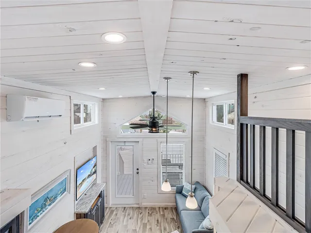 a bathroom with a sink a toilet and a shower