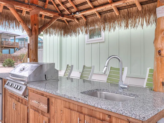 a view of a kitchen counter space with furniture