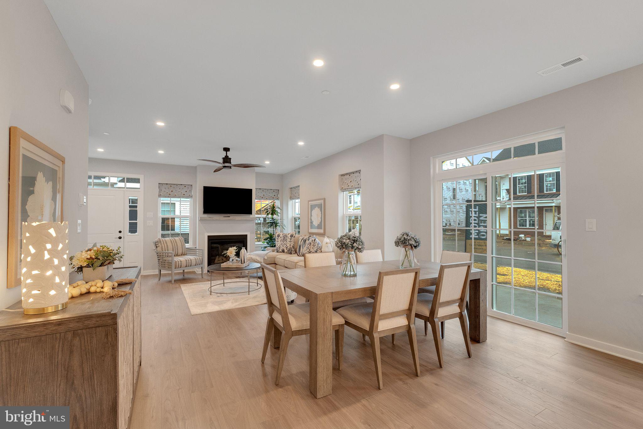 55 Cedar Lane Levittown, PA 19055 - Photo 5 of 9 a view of a dining room with furniture and wooden floor