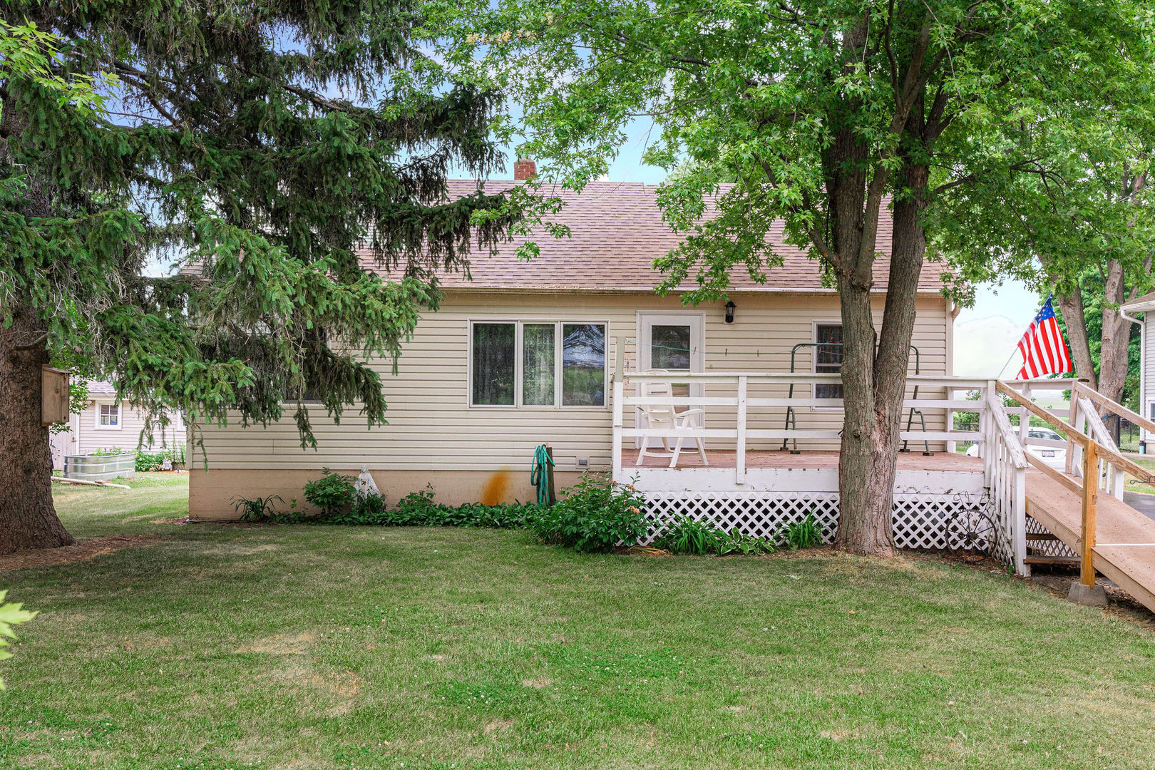 5N881 Meredith Road Maple Park, IL 60151 - Photo 1 of 29 a front view of a house with a garden