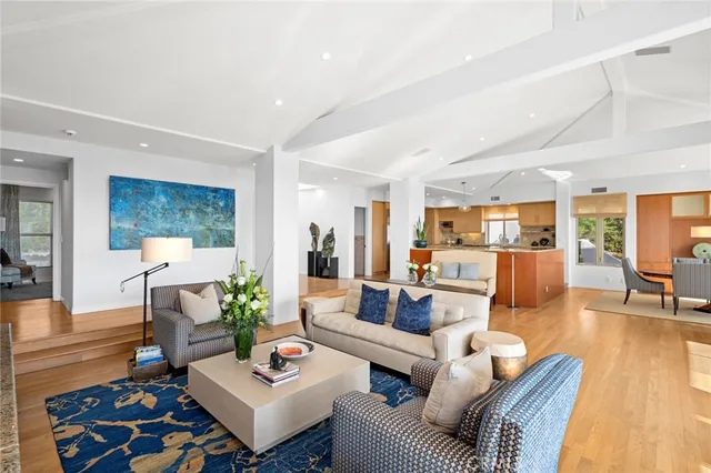 a kitchen with a stove window and cabinets