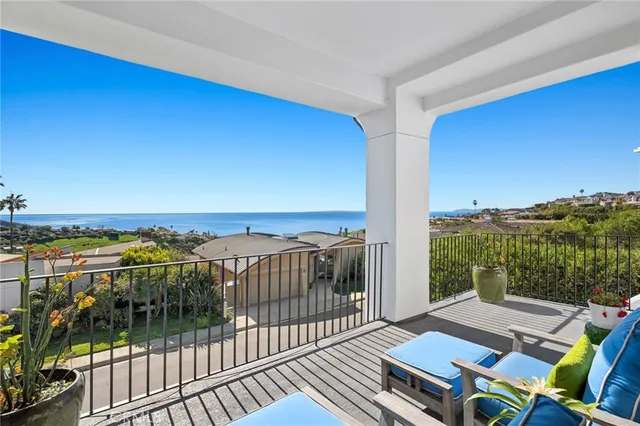 a view of balcony with furniture