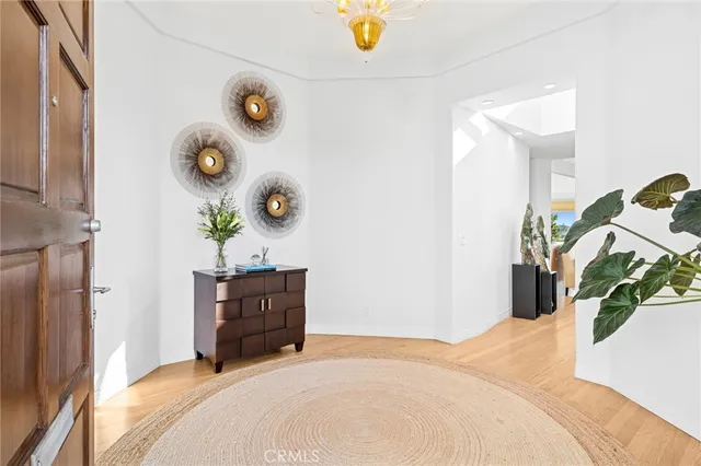 a bedroom with a bed and cabinets