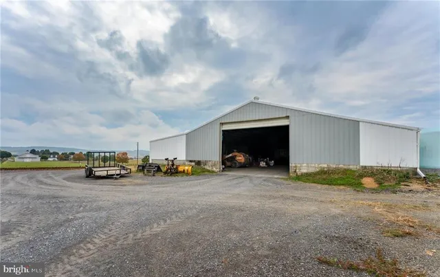 a view of a house with a stove and kitchen