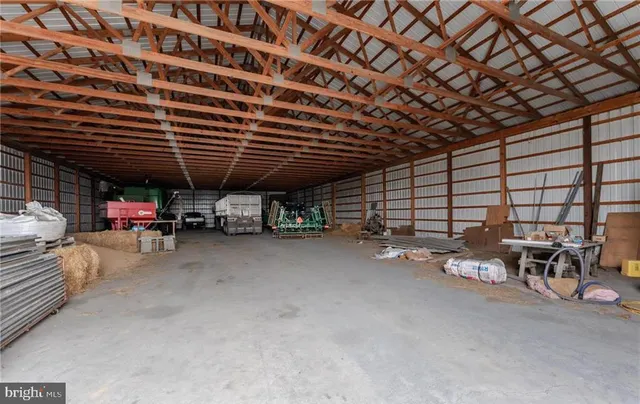 a view of parking garage with cars