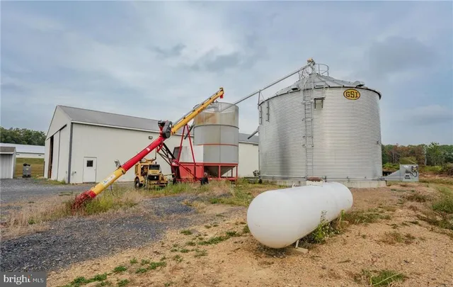 a view of a house with a street