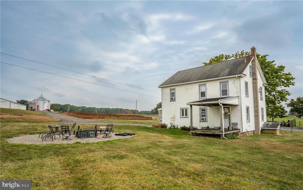 7573 Springhouse Road New Tripoli, PA 18066 - Photo 36 of 54 a view of a house with a yard and sitting area