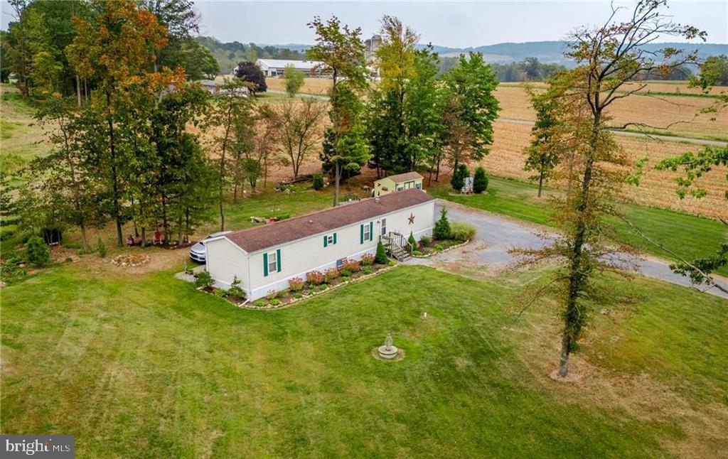 7573 Springhouse Road New Tripoli, PA 18066 - Photo 39 of 54 a view of a house with a yard