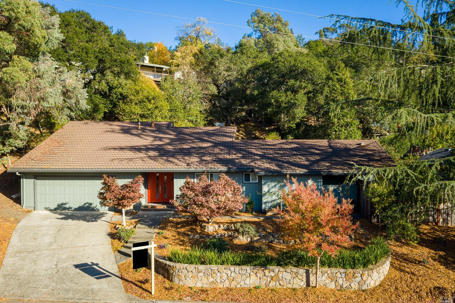 2516 Rancho Cabeza Drive Santa Rosa, CA 95404 - Photo 1 of 1 a view of a patio with table and chairs and potted plants
