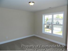 57 Ginseng Street Spring Lake, NC 28390 - Photo 15 of 25 an empty room with a window