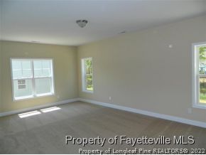 57 Ginseng Street Spring Lake, NC 28390 - Photo 19 of 25 an empty room with windows