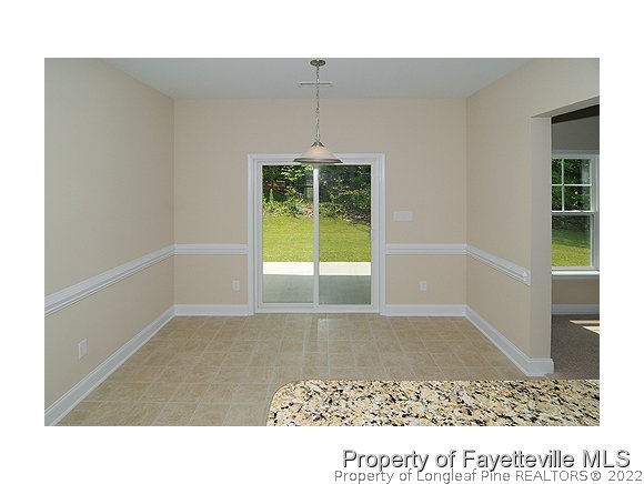57 Ginseng Street Spring Lake, NC 28390 - Photo 4 of 25 a black and white photo of a room