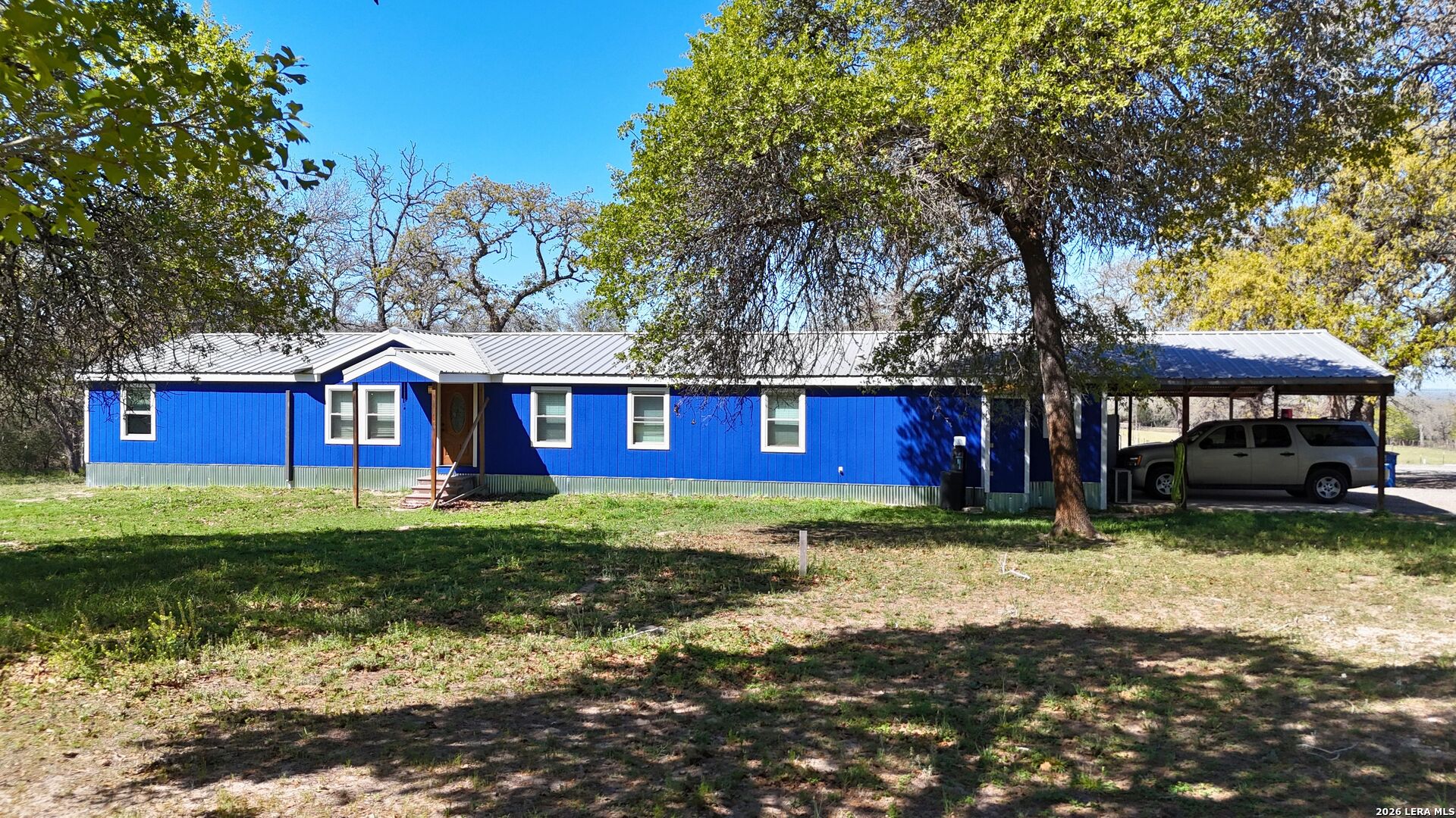 470 Lyon Road Seguin, TX 78155 - Photo 11 of 43 a view of a house with a yard